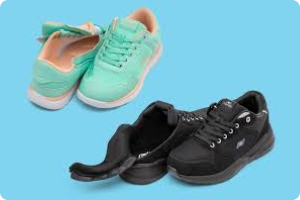 two pairs of childrens shoes on a turquoise background one mint green another black